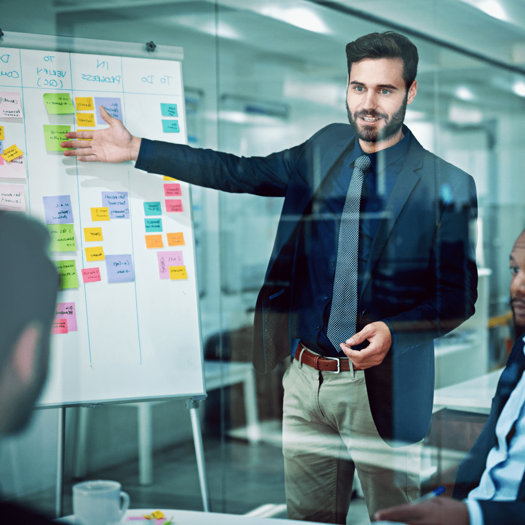 a man showing and teaching in meeting