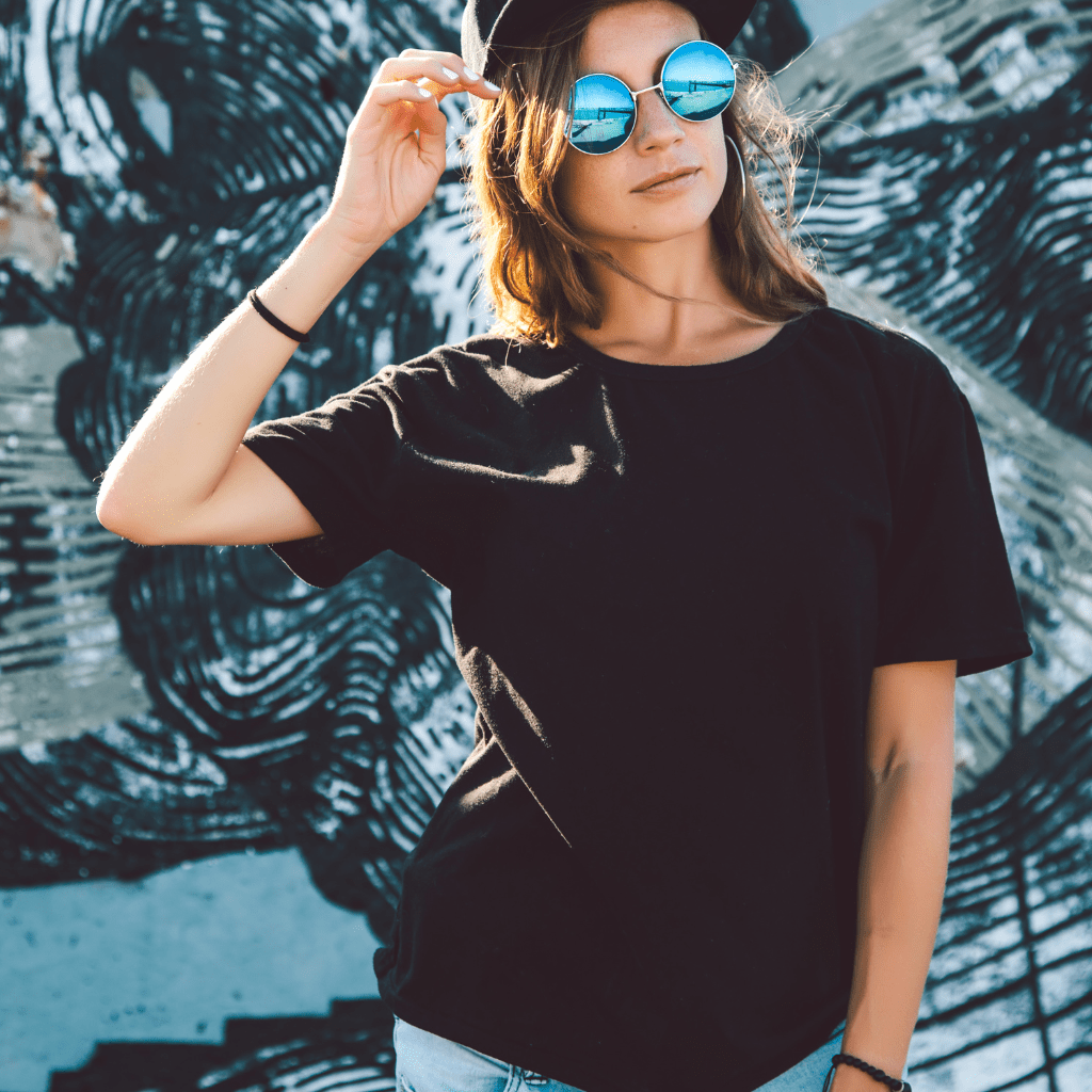 a women with black shirt and sunglass