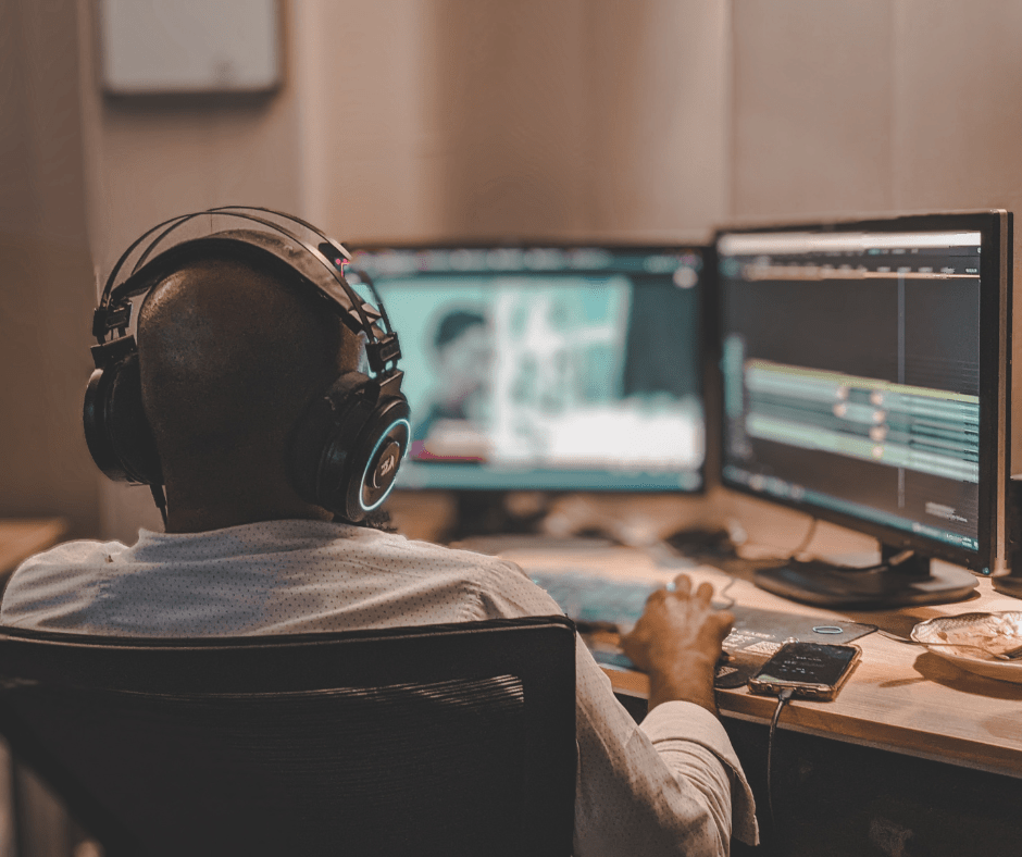 A man in audio studio with headphones