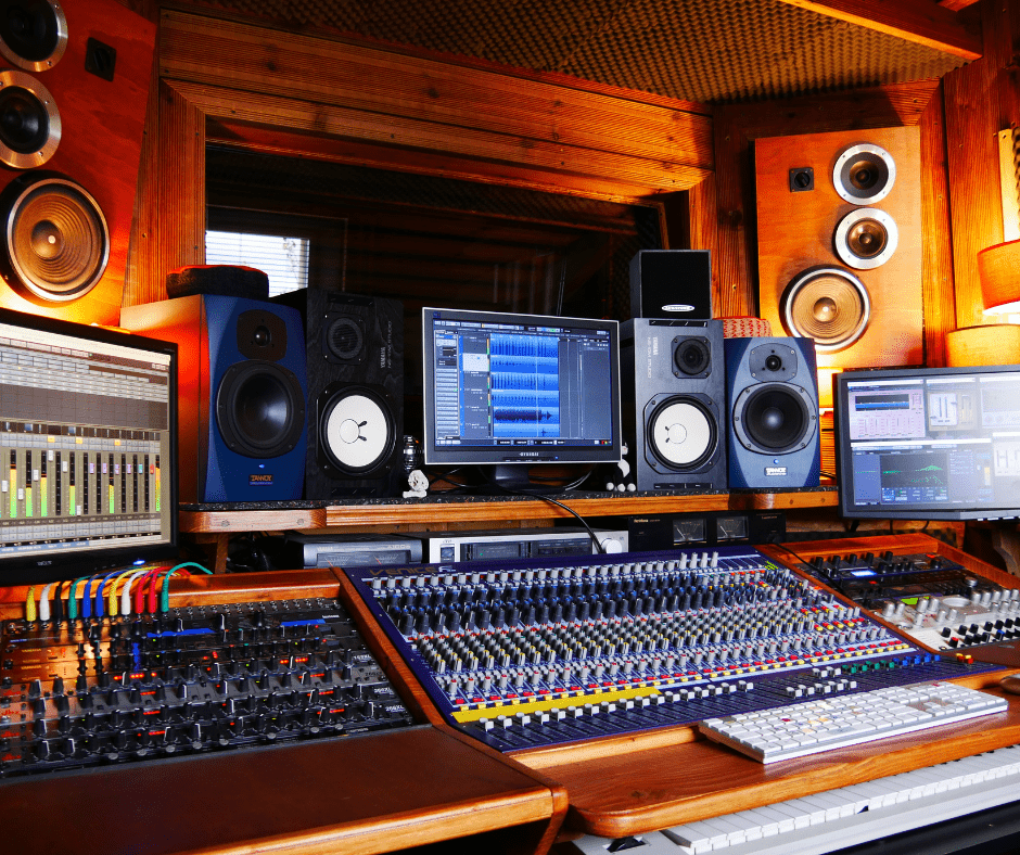 a audio studio with lots of equipments and computer